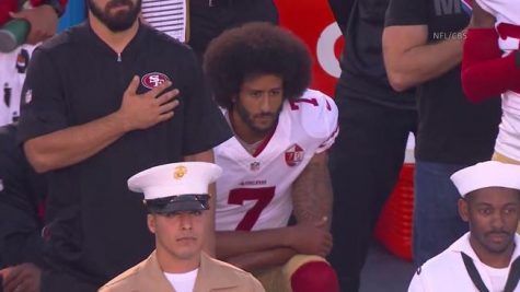 Pro: It is your right to sit during the National Anthem