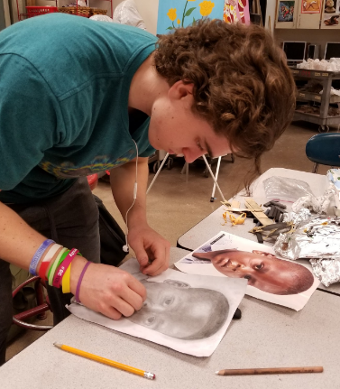 Junior Brendan OMalley working on his portrait.