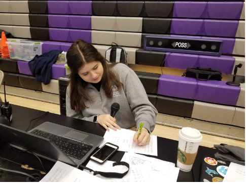 Hard at work: Claire Plunkett does announcing for a bocce tourney. Her parents inspired her to join Special Olympics.