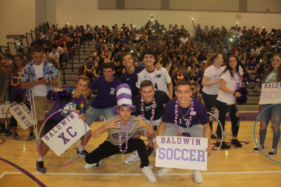 Boys soccer team shows off school spirit. The boys team starting this season with a new coach. 