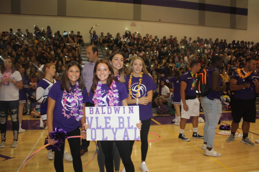 Girls+volleyball+team+poses+for+a+picture+at+the+Fall+pep+rally.