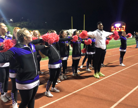 Smith-Schuster cheering with the Baldwin cheerleaders.