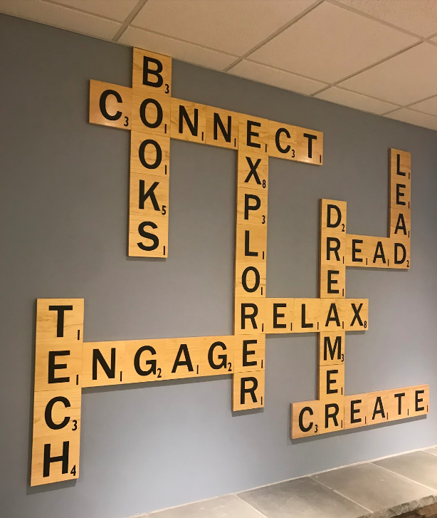 The library has been revamped with a new Scrabble decoration on the wall.