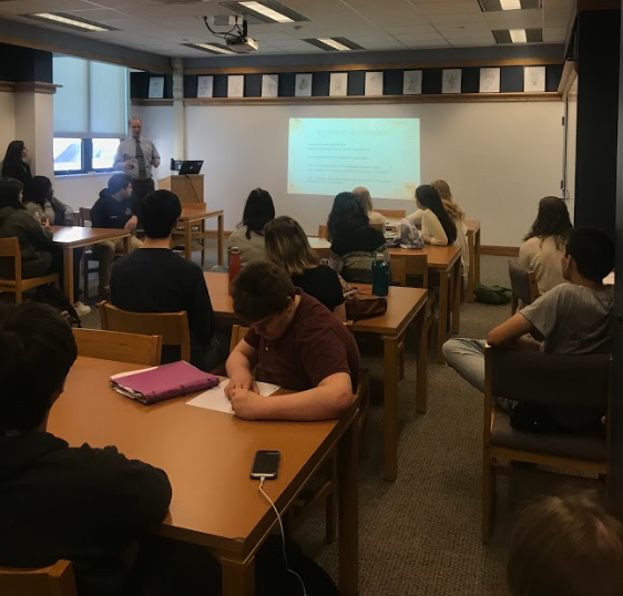 Teachers Mr. Foote, Ms. Foote, and Ms. Streets set up a pop-up classroom in the library to discuss the recent fire at Notre Dame.