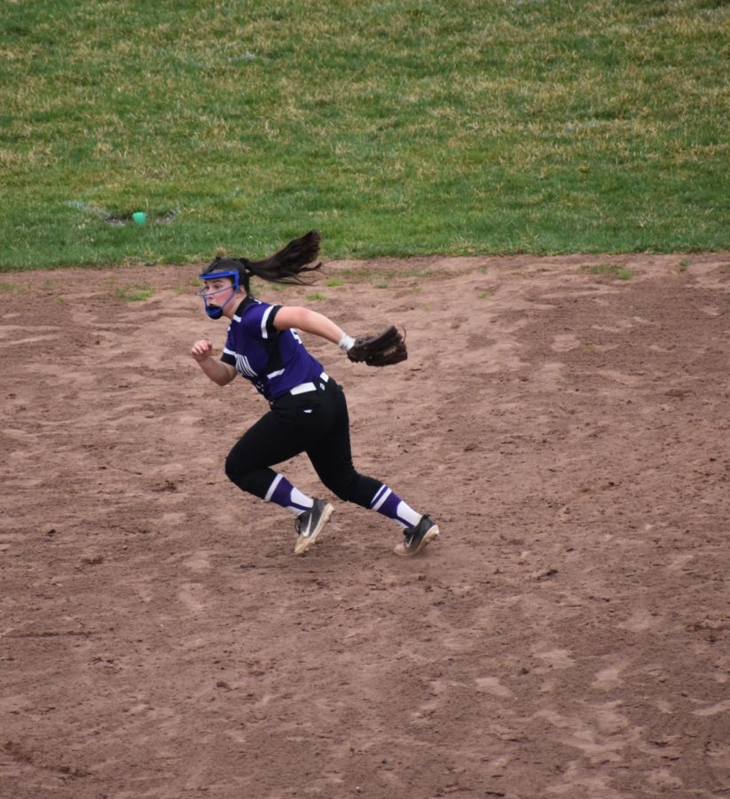 Freshman Maleah Pacella runs after a ball was hit in play.