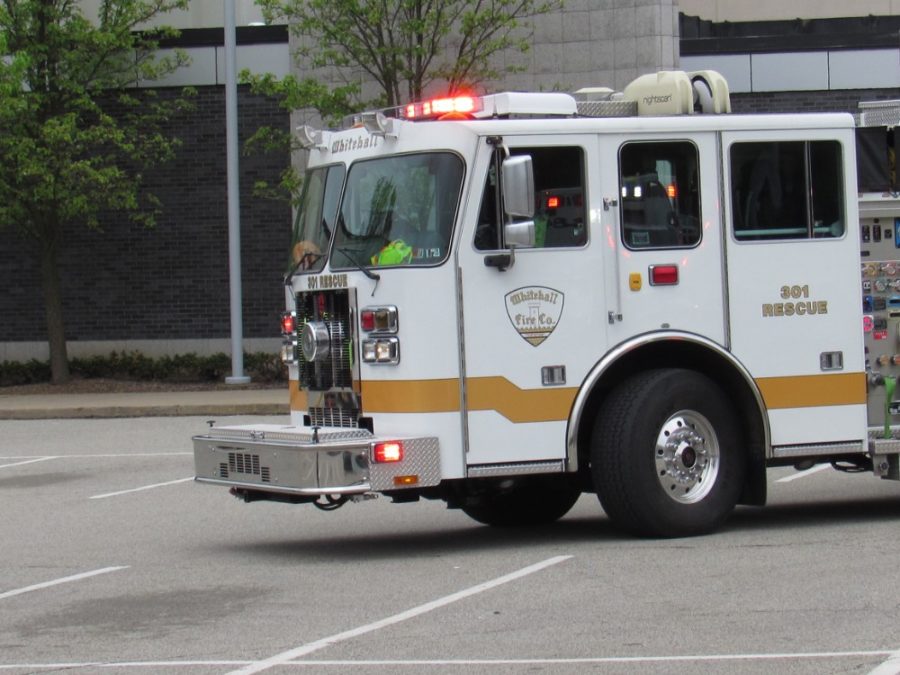 Emergency responders arrive on the scene of the Mock Crash to aid the actors.
