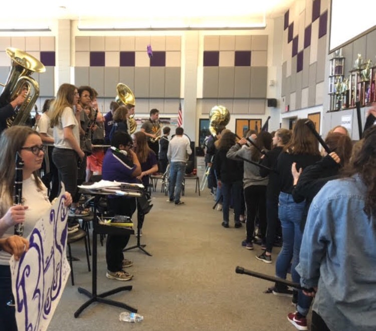 The band waits their turn to be featured in the Lip Dub. 