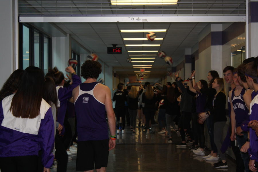 The track team and womens volleyball team prepare for their turn in the Lip Dub. 