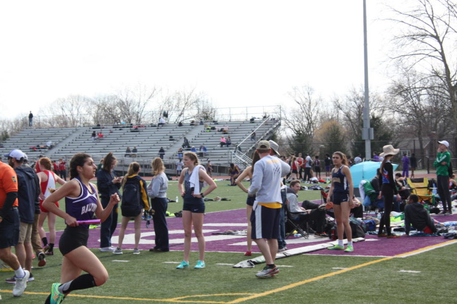 Sophomore Gina Bolla runs her leg of the 4x800 relay. Bolla also placed in the 1600 and 3200 meter events. 