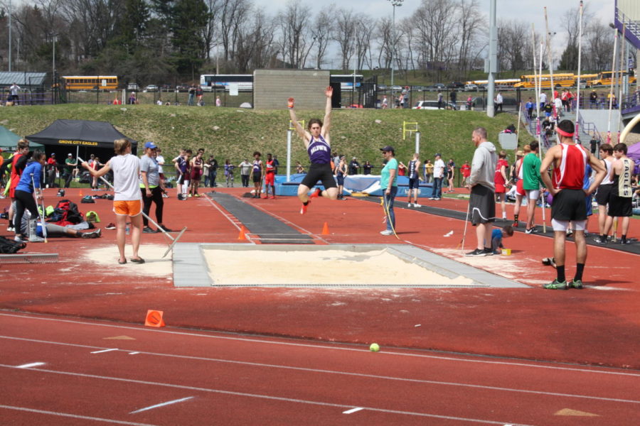 Senior Brendan OMalley competes in the long jump, an event he not only won but broke the school record in Saturday. 