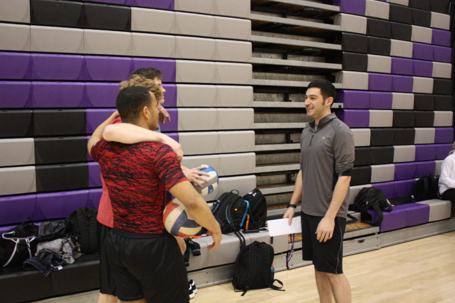 New Head coach Milan Yekich for boys volleyball talks to player during practice. Yekich takes over as head coach after the 22-year tenure of former Head Coach Eric Falcione.