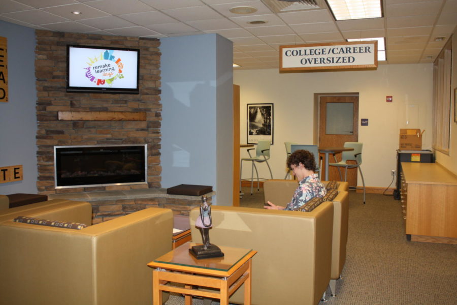 Senior James Luttringer studies in the new couch area in the library.