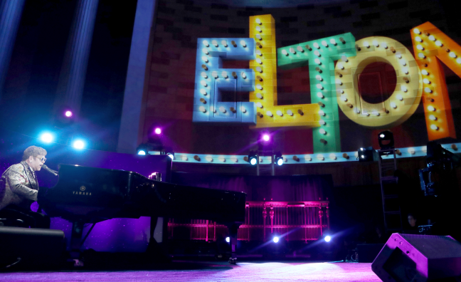 Elton John debuts new Peex device in tour to optimize fan experience.
