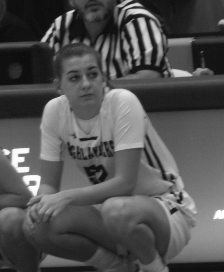  Jenna Lutz looks on during a recent game. Lutz will join the Allegheny College basketball team this fall. 