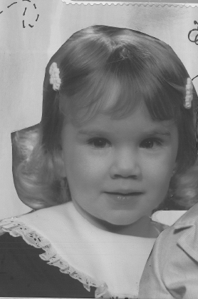 This photo is of Mrs. Krystal Schulte, English teacher, as a child.