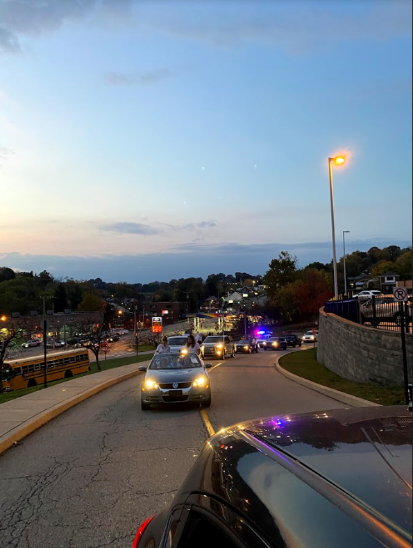 The homecoming parade makes its way up to Baldwin High School.