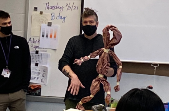 Master puppeteer Matt Acheson (right) and Chill Room therapist Greg Chaffee demonstrate therapy puppets at an introductory session. 