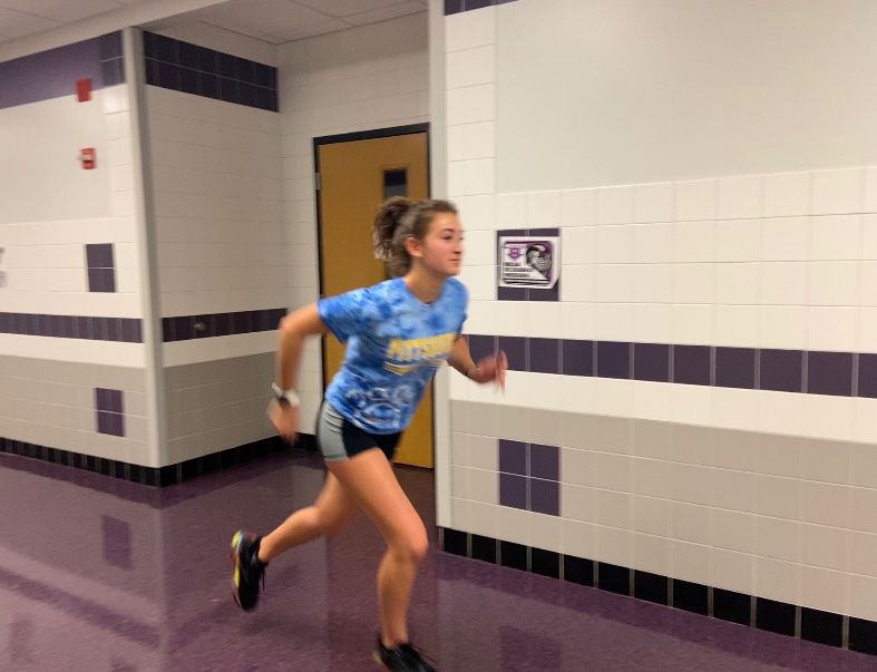 As+one+of+the+only+female+distance+runners+on+the+indoor+track+team%2C+sophomore+Kenzie+Hirt+is+a+noticeable+young+talent.