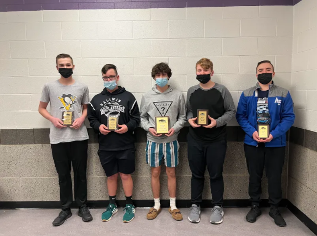 Members of the bowling team, Nolan Malloy (from left), Paul Kercher, Cade Stanko, Kelson Kleinhampl,  and Brady Malloy hold their plaques they received for placing second in the section.