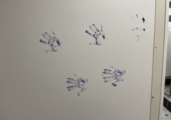 Handprints could be seen on the stalls of the third-floor boys bathroom this afternoon. 