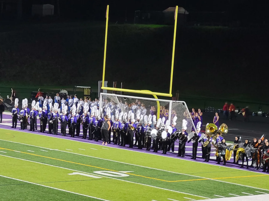 The Baldwin Highlander Marching Band prepares to take the field for their home competition.