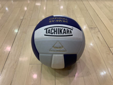 The boys varsity volleyball team competes during the spring sports season. 