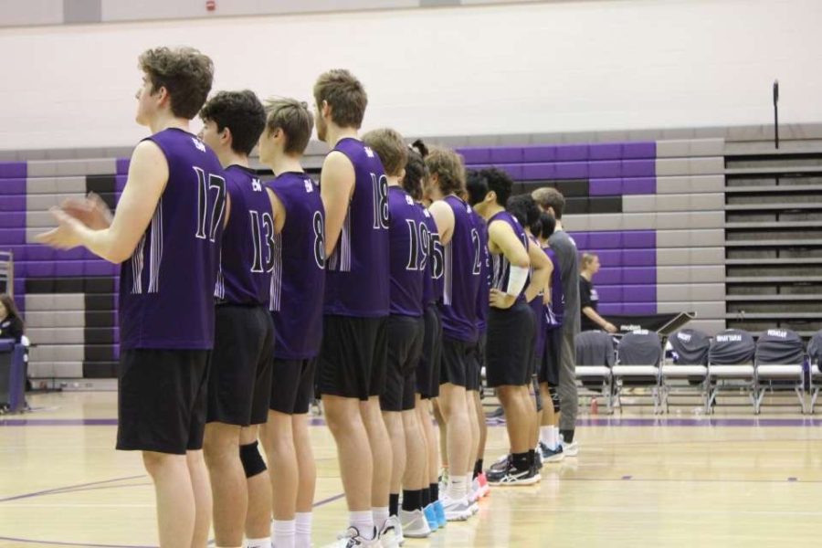 The boys varsity volleyball team competes during the spring sports season. 