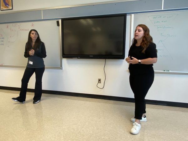 FBI agents Jenna Holt and Felicia Trovato present to students about cyber crime and online disinformation.