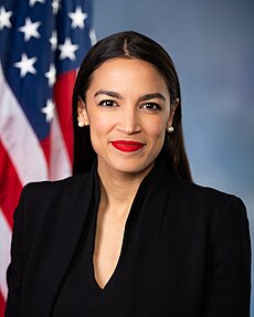  
Alexandria Ocasio-Cortez, a member of The Squad in Congress, has adopted a lower profile recently. Photo via Franmarie_Metzler;_U.S._House_Office_of_Photography.