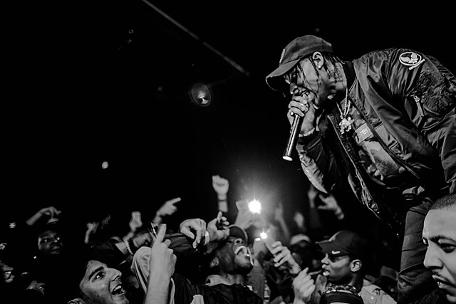 Travis Scott has named his current tour the Circus Maximus tour. Travis Scott by Brandon Dull is licensed under CC BY 2.0 DEED.