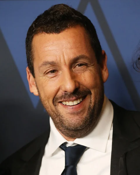 Adam Sandler stands out in all of his comedy movies, setting a great impression for himself and his films. 
Photo via Britannica
