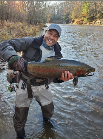 Math teacher Bryan Black caught this 34-inch steelhead in Elk Creek in Erie, Pa., in 2023. Black always practices catch-and-release fishing. Photo courtesy Bryan Black.
