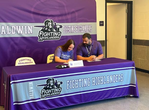 Senior Alayna Kercher signs at Chatham University to continue her swimming career. 
