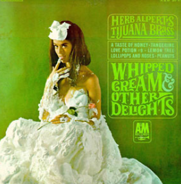 Whipped Cream and Other Delights is an instrumental album by Herb Alpert and the Tijuana Brass. Photo via A&M Records. 