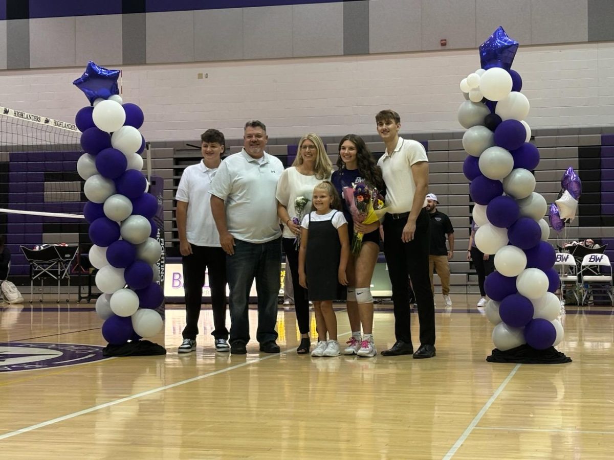 Senior Kaylee Smolko is recognized before the game on senior recognition night.