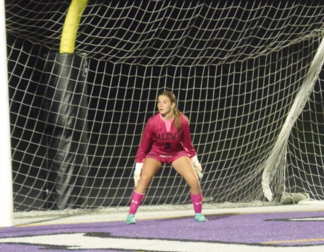 Baldwins goalie prepares to stop the ball.