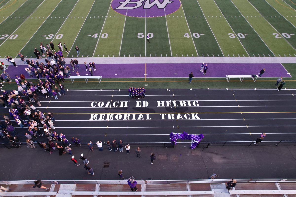 The track is renamed for long time track coach Ed Helbig at the Celebration of Life ceremony on Saturday. Helbig, 72, died the week before school began after a year-long cancer battle.