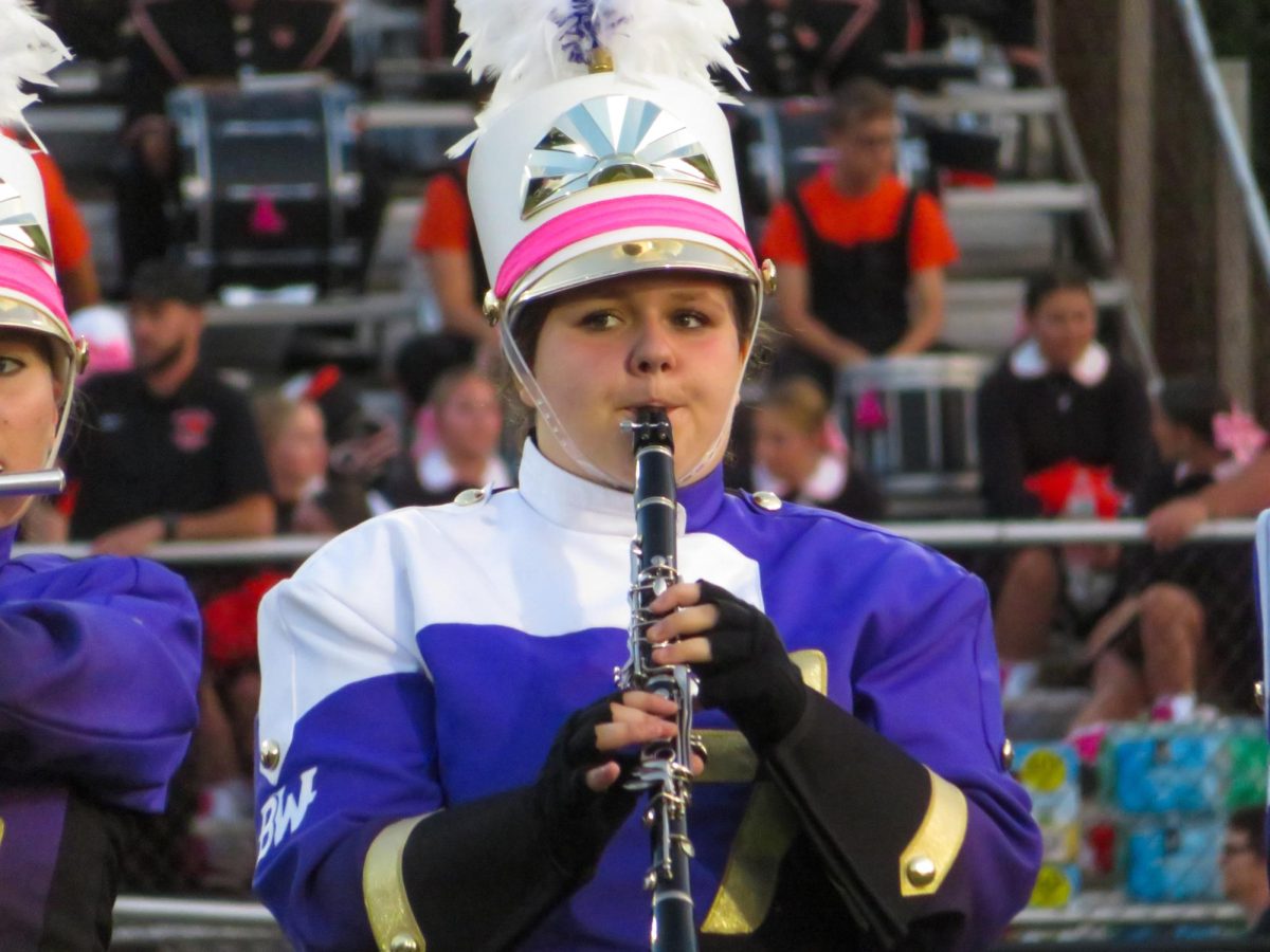 Sophomore Alexis Bendel plays her clarinet before the game against Bethel Park.