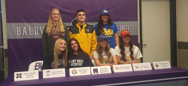 Seniors signed their letters of intent to continue their academic and athletic careers.