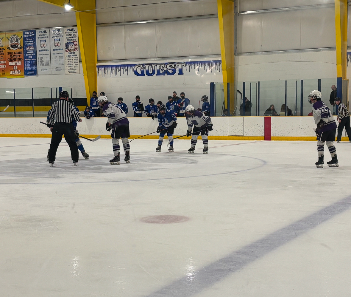 Senior Logan Cramer lines up at center for the second period.