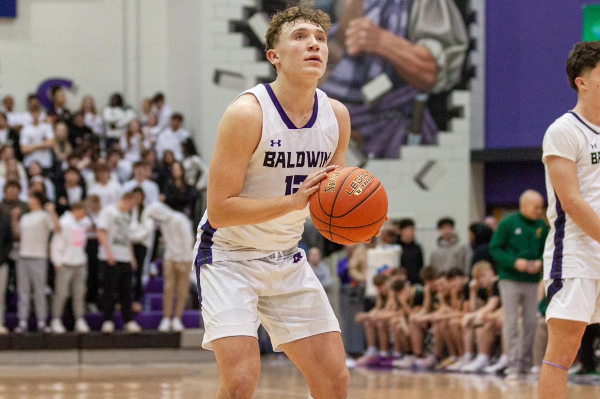 Junior Max Marzina shoots a free throw in the second half against Penn-Trafford.