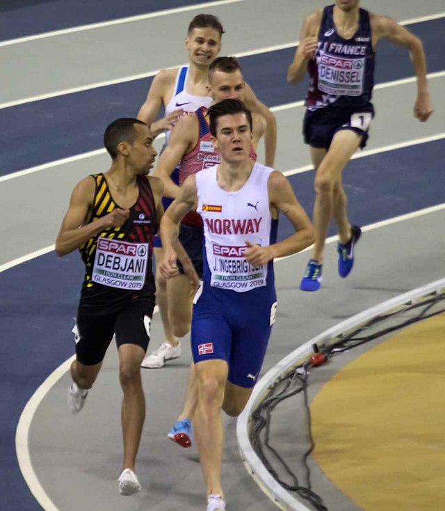 Jakob Ingebrigsten breaks the indoor mile and 1,500 meter world record in one race. Jakob Ingebrigsten by Fillip Bossuyt is licensed under   CC BY 2.0.