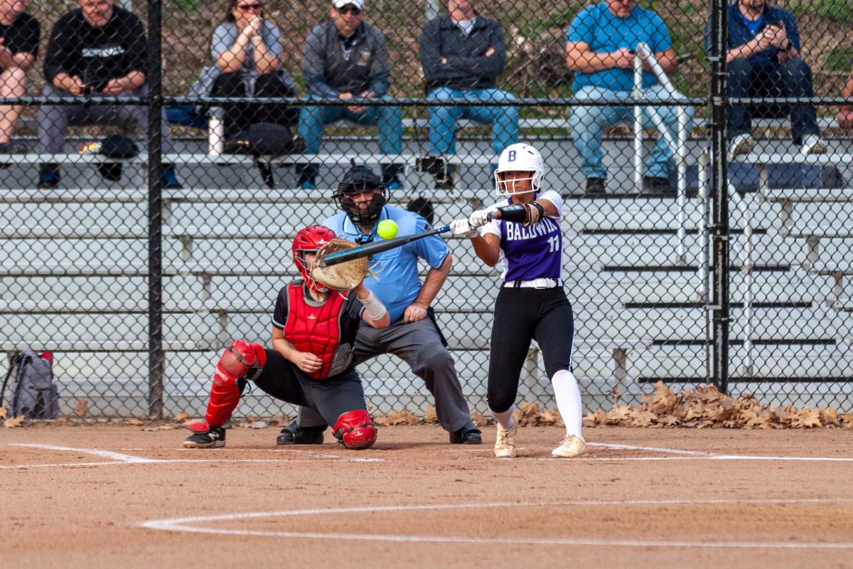 Senior Ryley Shaw attempts to hit the ball against Norwin.