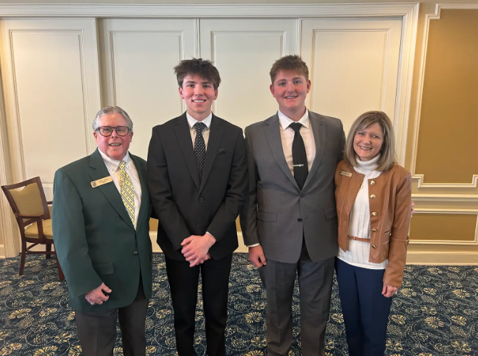 Baldwin's Zach Auel has won a college scholarship for caddying. Gary Evans (from left), Auel, Tyler Feth, and Karen Evans are pictured at the Evans Scholarship interviews. Photo via Gary Evans.