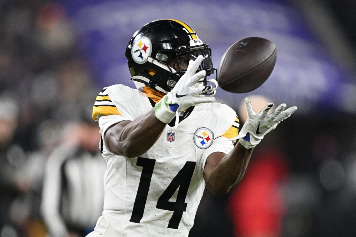 Jan 11, 2025; Baltimore, Maryland, USA; Pittsburgh Steelers wide receiver George Pickens (14) makes a catch against the Baltimore Ravens in the third quarter in an AFC wild card game at M&T Bank Stadium. Tommy Gilligan-Imagn Images/ File Photo