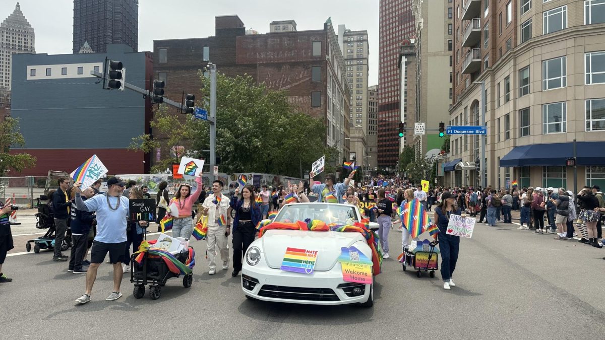 Pittsburgh Pride Parade marchers walk through the city. 