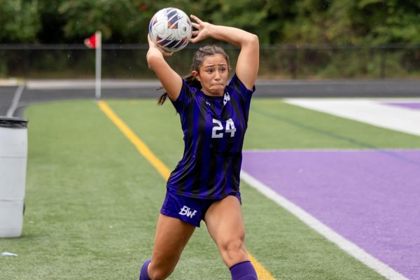 Freshman Avery Lieu throws the ball in against Mount Lebanon.