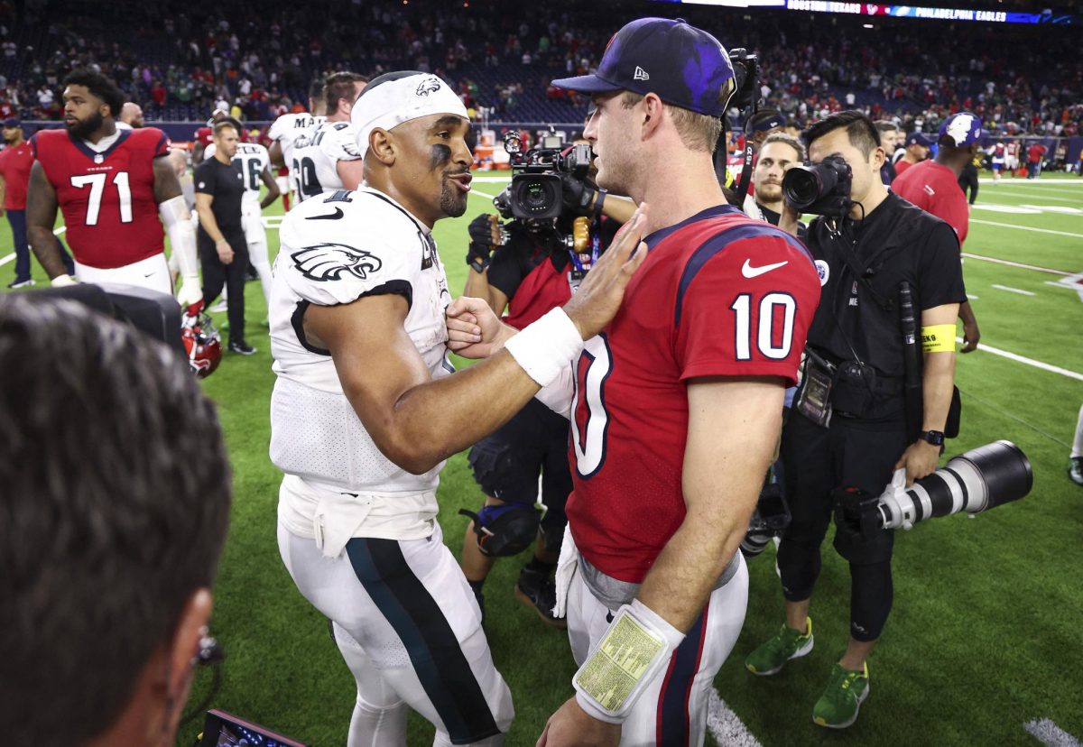 Nov 3, 2022; Houston, Texas, USA; Philadelphia Eagles quarterback Jalen Hurts (1) talks with Houston Texans quarterback Davis Mills (10) after the game at NRG Stadium. Mandatory Credit: Troy Taormina-USA TODAY Sports