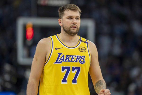 Apr 25, 2025; Minneapolis, Minnesota, USA; Los Angeles Lakers guard Luka Doncic (77) looks on against the Minnesota Timberwolves in the first half during game three of first round for the 2024 NBA Playoffs at Target Center. Mandatory Credit: Jesse Johnson-Imagn Images/File photo