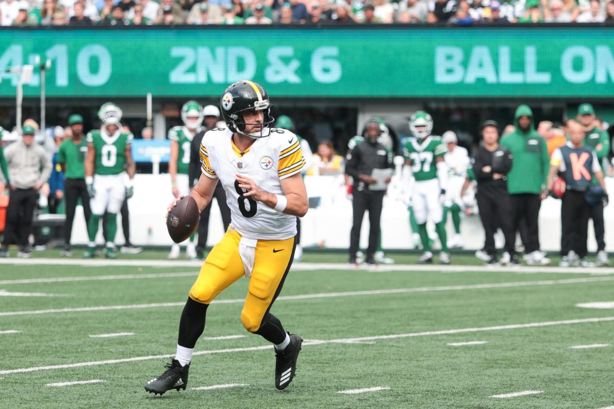 Sep 7, 2025; East Rutherford, New Jersey, USA; Pittsburgh Steelers quarterback Aaron Rodgers (8) prepares to throw the ball during the second half against the New York Jets at MetLife Stadium. Mandatory Credit: Vincent Carchietta-Imagn Images